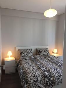 Giường trong phòng chung tại Milpark Apartment