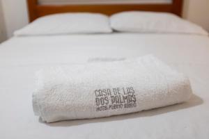 Postel nebo postele na pokoji v ubytování Hotel Casa de las Dos Palmas -Hotel Boutique