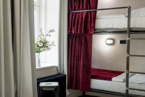 Postel nebo postele na pokoji v ubytování Wake Up Wellness Hostel