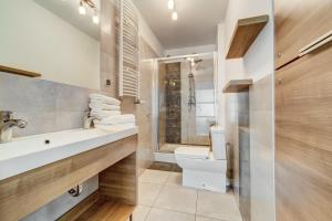 Kúpeľňa v ubytovaní Apartamenty Sun & Snow Kopernika