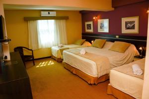 Katil atau katil-katil dalam bilik di leclub resort hotel