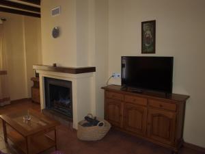 TV a/nebo společenská místnost v ubytování Apartamentos El Mirador