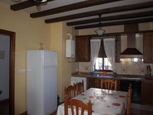 Kuchyň nebo kuchyňský kout v ubytování Apartamentos El Mirador