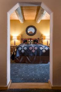 a bedroom with a bed in a room at Mariposa Lodge Bed and Breakfast in Steamboat Springs