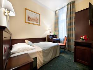 Posteľ alebo postele v izbe v ubytovaní EA Hotel Downtown