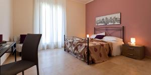 Postel nebo postele na pokoji v ubytování Hotel La Campana