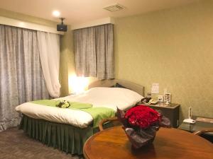 Ліжко або ліжка в номері Pal Annex Nakatsu (Love Hotel)