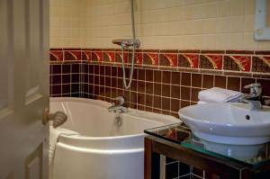 A bathroom at Three Ways House Hotel; BW Signature Collection 