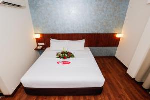 Postel nebo postele na pokoji v ubytování My Hotel @ KL Sentral