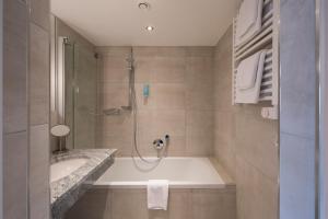 Kúpeľňa v ubytovaní Hotel Sailer