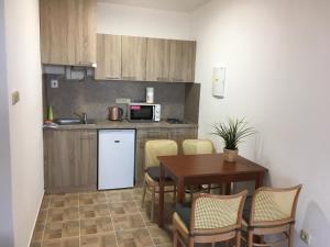 Kuchyň nebo kuchyňský kout v ubytování Apartmány s klimatizací - Penzion U Kudláčků Pouzdřany