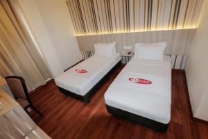Postel nebo postele na pokoji v ubytování My Hotel @ KL Sentral