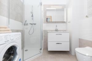 Kúpeľňa v ubytovaní Jantar Apartamenty Bliżej Morza