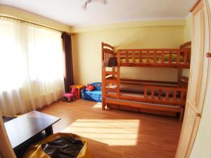 Postel nebo postele na pokoji v ubytování Pokoje Sylwia z aneksami kuchennymi w każdym pokoju
