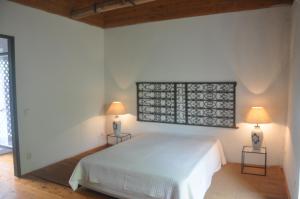 Uma cama ou camas num quarto em Convento de São Francisco