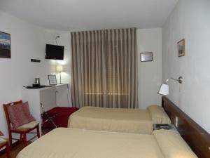 TV a/nebo společenská místnost v ubytování Hostal Coruña
