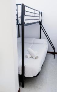 Postel nebo postele na pokoji v ubytování Appartamentino Ciccio