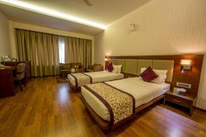 Postel nebo postele na pokoji v ubytování Hotel Eefa
