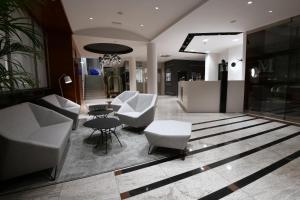 Lobbyn eller receptionsområdet på Aparthotel Milenij