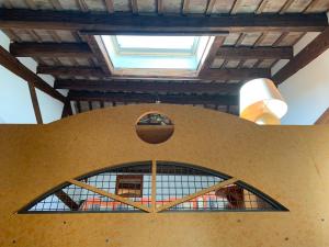 a window in a building with a skylight at Le Residenze dei Serravallo in Trieste