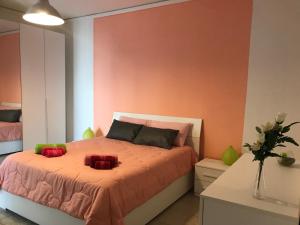 A bed or beds in a room at Suite Paolo