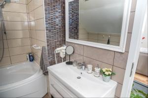 Koupelna v ubytování Apartman Hubertus 5*