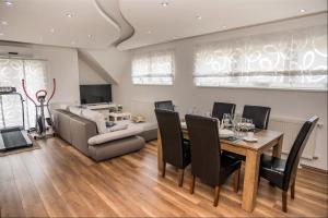 Posezení v ubytování Apartman Hubertus 5*