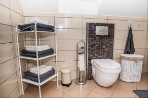 Koupelna v ubytování Apartman Hubertus 5*