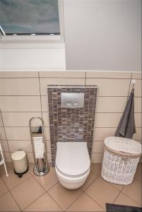 Koupelna v ubytování Apartman Hubertus 5*