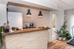 Kuchyň nebo kuchyňský kout v ubytování Apartman Hubertus 5*