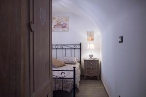 Posteľ alebo postele v izbe v ubytovaní Dimora Porto Canale