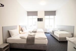 Posteľ alebo postele v izbe v ubytovaní Narodni Stay