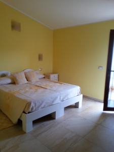 Postel nebo postele na pokoji v ubytování Sardinia for you