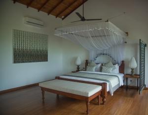 Calamansi Cove Villas 객실 침대