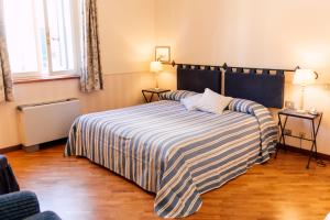 Postel nebo postele na pokoji v ubytování Hostellerie Du Golf
