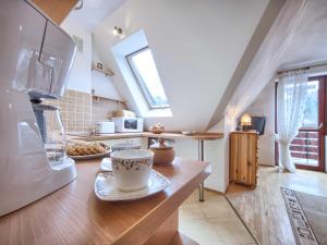 Kuchyňa alebo kuchynka v ubytovaní VisitZakopane - Himalaya Apartment