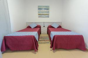 Posteľ alebo postele v izbe v ubytovaní Guardamar playa + 31 fotografií