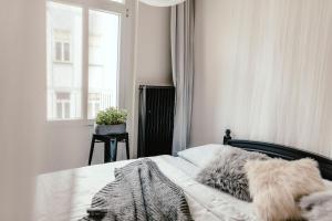 Postel nebo postele na pokoji v ubytování Wake Up Wellness Hostel