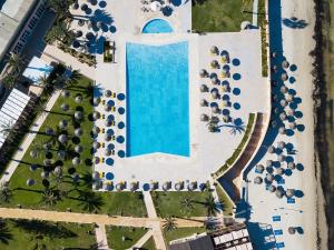 an overhead view of a pool at a resort at AQI Skanes Resort in Monastir