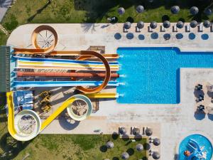 an overhead view of a swimming pool with a pool at AQI Skanes Resort in Monastir