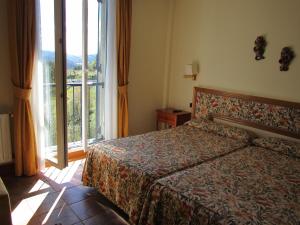 Postel nebo postele na pokoji v ubytování Hotel Ermintxo + 37 fotografií