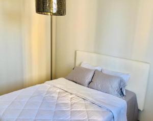 Katil atau katil-katil dalam bilik di Delightful Ocean View Apartment - PH Quartier Del Mar +28 gambar