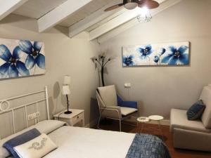A bed or beds in a room at Agroturismo Ibarra