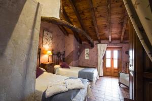 Postel nebo postele na pokoji v ubytování Casa Rural & Spa La Graja