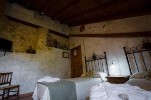 Postel nebo postele na pokoji v ubytování Casa Rural & Spa La Graja