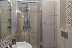 Łazienka w obiekcie Apartamenty Ewa II