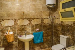 A bathroom at Jamila cosy apartment
