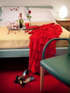 A bed or beds in a room at Park Hotel Centro Congressi