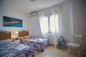 Ένα ή περισσότερα κρεβάτια σε δωμάτιο στο Villa 25