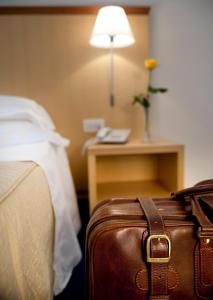 A bed or beds in a room at Park Hotel Centro Congressi